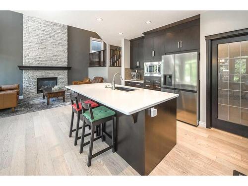 35 Aspen Summit Mount Sw, Calgary, AB - Indoor Photo Showing Kitchen With Double Sink With Upgraded Kitchen