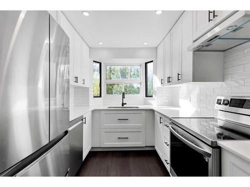 303-3719C 49 Street Nw, Calgary, AB - Indoor Photo Showing Kitchen With Stainless Steel Kitchen With Upgraded Kitchen