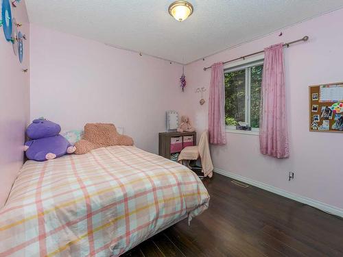 7 Helms Ridge, Rural Rocky View County, AB - Indoor Photo Showing Bedroom