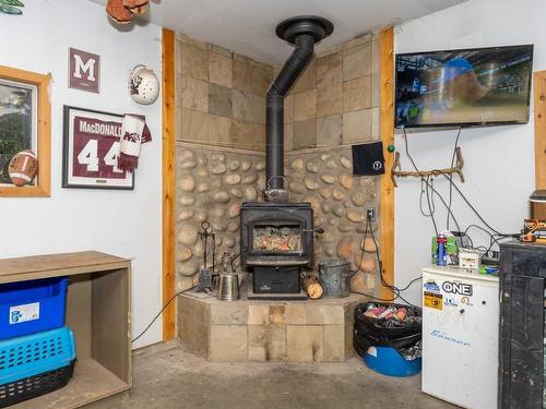 7 Helms Ridge, Rural Rocky View County, AB - Indoor Photo Showing Other Room With Fireplace