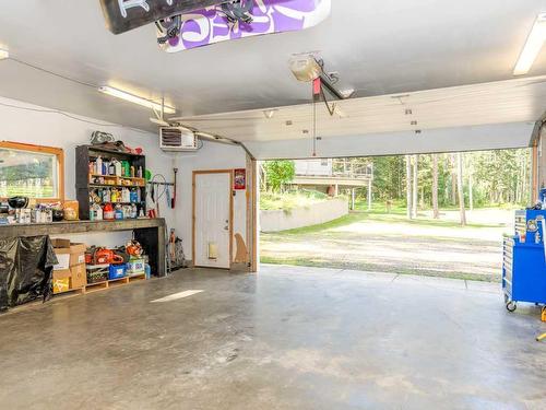 7 Helms Ridge, Rural Rocky View County, AB - Indoor Photo Showing Garage