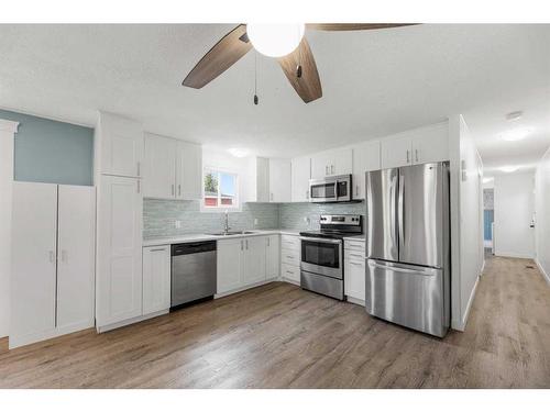 8 Spring Haven Close Se, Airdrie, AB - Indoor Photo Showing Kitchen