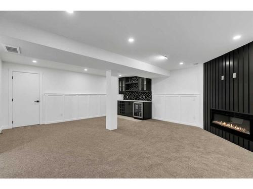 5512 Silverdale Drive Nw, Calgary, AB - Indoor With Fireplace