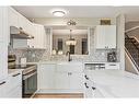 5-99 Midpark Gardens Se, Calgary, AB  - Indoor Photo Showing Kitchen With Upgraded Kitchen 