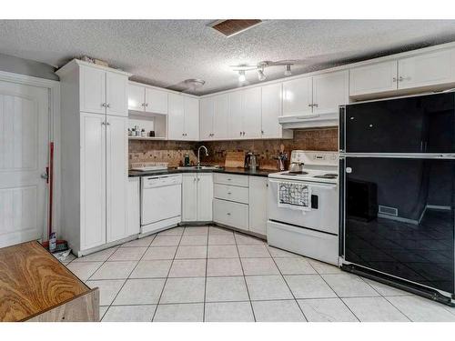 56 Marcombe Place Ne, Calgary, AB - Indoor Photo Showing Kitchen