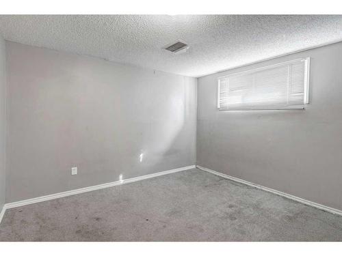 56 Marcombe Place Ne, Calgary, AB - Indoor Photo Showing Other Room