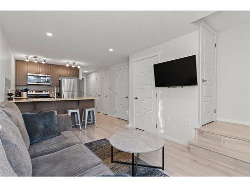 412-338 Seton Circle Se, Calgary, AB - Indoor Photo Showing Living Room