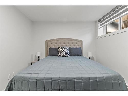 412-338 Seton Circle Se, Calgary, AB - Indoor Photo Showing Bedroom