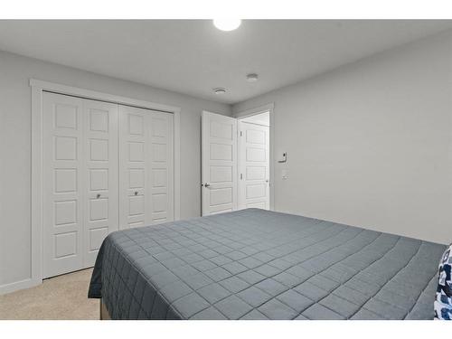 412-338 Seton Circle Se, Calgary, AB - Indoor Photo Showing Bedroom