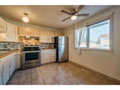 86 Huntwick Way Ne, Calgary, AB - Indoor Photo Showing Kitchen With Stainless Steel Kitchen