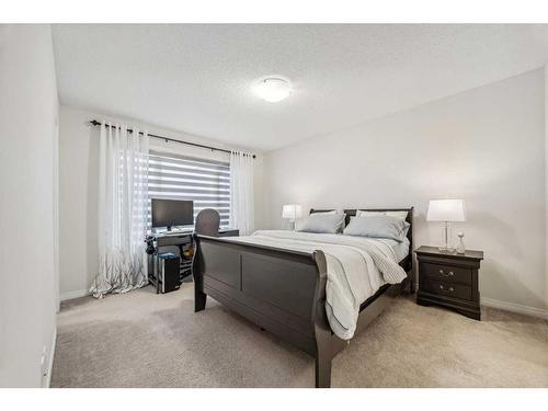 417 Carringvue Avenue Nw, Calgary, AB - Indoor Photo Showing Bedroom