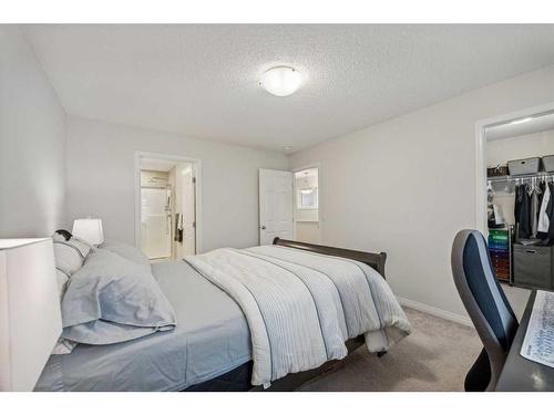 417 Carringvue Avenue Nw, Calgary, AB - Indoor Photo Showing Bedroom