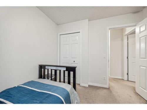 417 Carringvue Avenue Nw, Calgary, AB - Indoor Photo Showing Bedroom