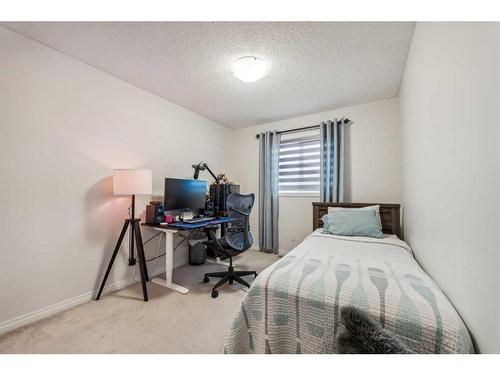 417 Carringvue Avenue Nw, Calgary, AB - Indoor Photo Showing Bedroom