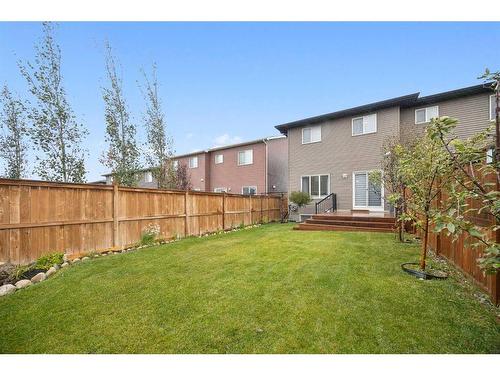 417 Carringvue Avenue Nw, Calgary, AB - Outdoor With Backyard