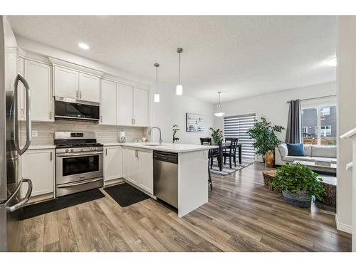 417 Carringvue Avenue Nw, Calgary, AB - Indoor Photo Showing Kitchen With Stainless Steel Kitchen With Upgraded Kitchen