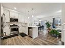 417 Carringvue Avenue Nw, Calgary, AB  - Indoor Photo Showing Kitchen With Stainless Steel Kitchen With Upgraded Kitchen 