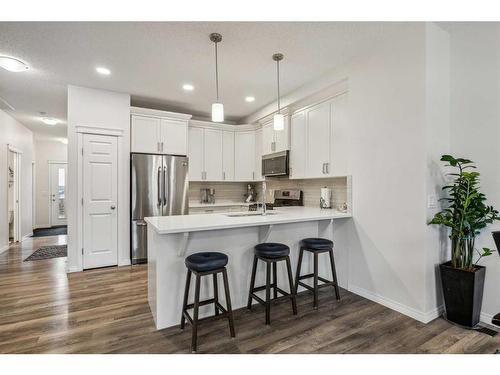 417 Carringvue Avenue Nw, Calgary, AB - Indoor Photo Showing Kitchen With Upgraded Kitchen