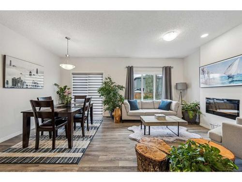 417 Carringvue Avenue Nw, Calgary, AB - Indoor Photo Showing Living Room With Fireplace