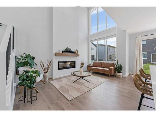 28 Walcrest Row Se, Calgary, AB - Indoor Photo Showing Living Room With Fireplace