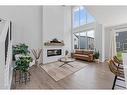 28 Walcrest Row Se, Calgary, AB  - Indoor Photo Showing Living Room With Fireplace 