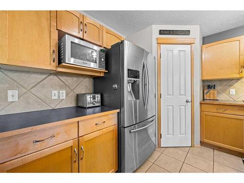 209 Tuscany Ravine Road Nw, Calgary, AB - Indoor Photo Showing Kitchen