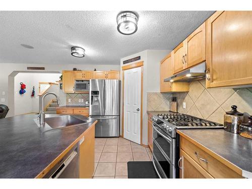 209 Tuscany Ravine Road Nw, Calgary, AB - Indoor Photo Showing Kitchen