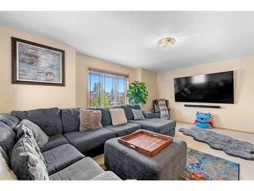 209 Tuscany Ravine Road Nw, Calgary, AB - Indoor Photo Showing Living Room