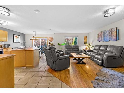 209 Tuscany Ravine Road Nw, Calgary, AB - Indoor Photo Showing Living Room