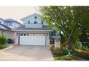 25 Arbour Summit Close Nw, Calgary, AB  - Outdoor With Facade 