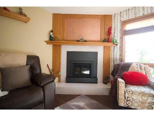 25 Arbour Summit Close Nw, Calgary, AB - Indoor Photo Showing Living Room With Fireplace