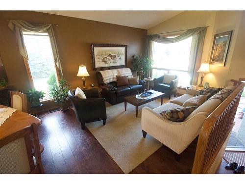 25 Arbour Summit Close Nw, Calgary, AB - Indoor Photo Showing Living Room