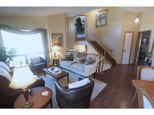 25 Arbour Summit Close Nw, Calgary, AB - Indoor Photo Showing Living Room