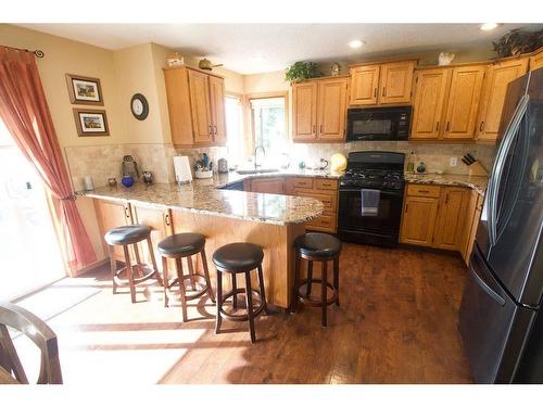 25 Arbour Summit Close Nw, Calgary, AB - Indoor Photo Showing Kitchen