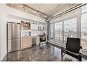 1010-1319 14 Avenue Sw, Calgary, AB  - Indoor Photo Showing Kitchen With Stainless Steel Kitchen 