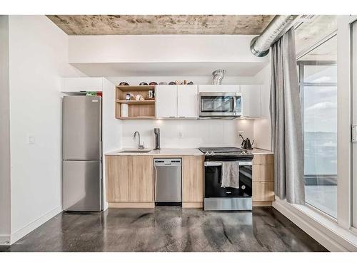 1010-1319 14 Avenue Sw, Calgary, AB - Indoor Photo Showing Kitchen With Stainless Steel Kitchen