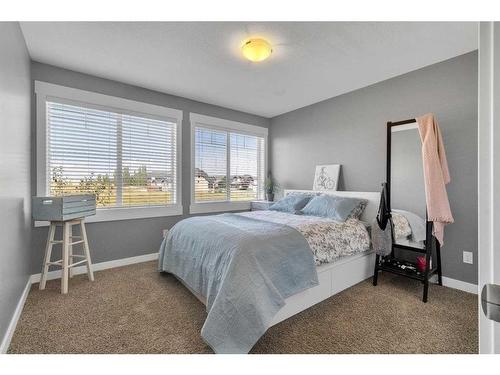 288 Rainbow Falls Green, Chestermere, AB - Indoor Photo Showing Bedroom