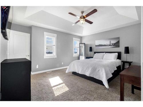 288 Rainbow Falls Green, Chestermere, AB - Indoor Photo Showing Bedroom