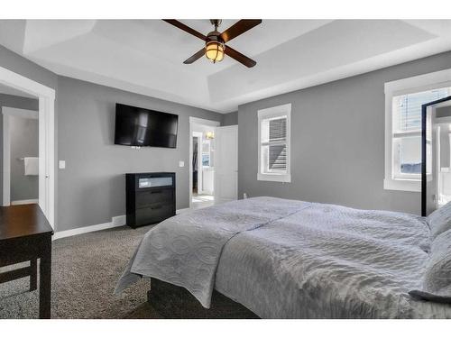 288 Rainbow Falls Green, Chestermere, AB - Indoor Photo Showing Bedroom