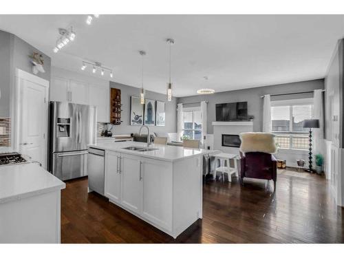 288 Rainbow Falls Green, Chestermere, AB - Indoor Photo Showing Kitchen With Double Sink With Upgraded Kitchen