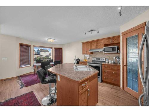 147 Silverado Plains Close Sw Calgary Close Sw, Calgary, AB - Indoor Photo Showing Kitchen With Double Sink