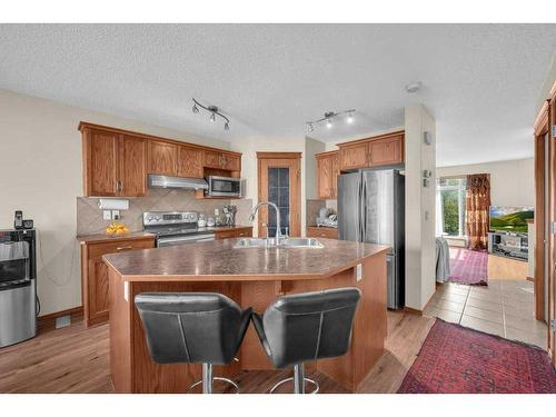 147 Silverado Plains Close Sw Calgary Close Sw, Calgary, AB - Indoor Photo Showing Kitchen With Stainless Steel Kitchen With Double Sink