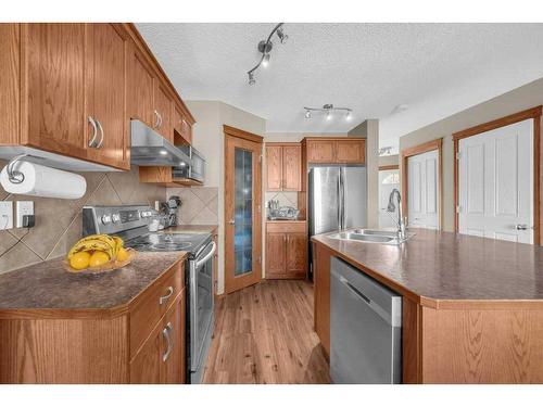 147 Silverado Plains Close Sw Calgary Close Sw, Calgary, AB - Indoor Photo Showing Kitchen With Double Sink