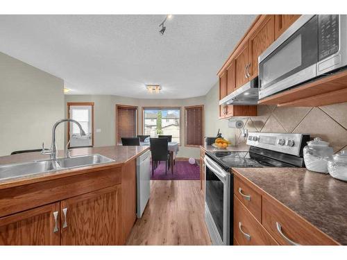 147 Silverado Plains Close Sw Calgary Close Sw, Calgary, AB - Indoor Photo Showing Kitchen With Double Sink