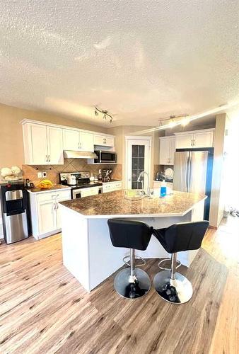 147 Silverado Plains Close Sw Calgary Close Sw, Calgary, AB - Indoor Photo Showing Kitchen With Stainless Steel Kitchen