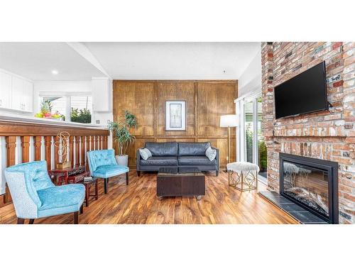 531 Cedarille Crescent Sw, Calgary, AB - Indoor Photo Showing Living Room With Fireplace