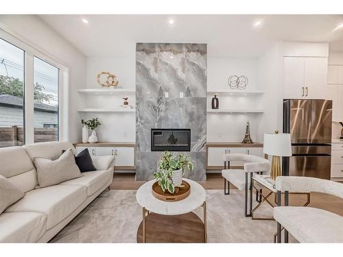 3717 2 Avenue Sw, Calgary, AB - Indoor Photo Showing Living Room With Fireplace