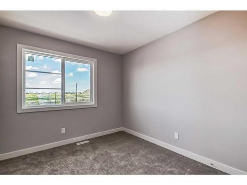 336 Waterford Boulevard, Chestermere, AB - Indoor Photo Showing Other Room