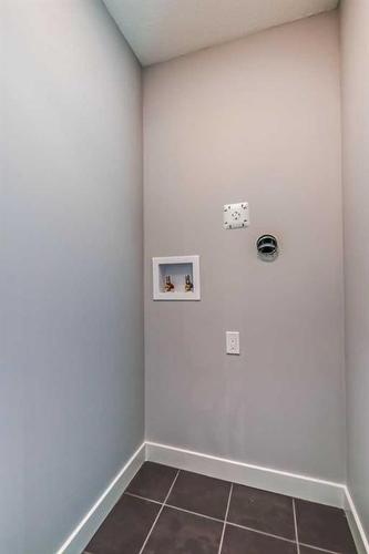 336 Waterford Boulevard, Chestermere, AB - Indoor Photo Showing Other Room