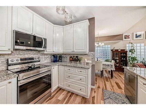 107-6650 Old Banff Coach Road Sw, Calgary, AB - Indoor Photo Showing Kitchen With Upgraded Kitchen